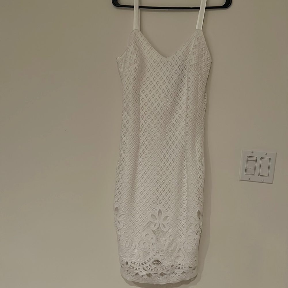 white lace dress with ribbon straps